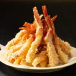 民宿かず子の定番メニュー「カニづくしプラン」では「カニ天ぷら丼」も食べられます